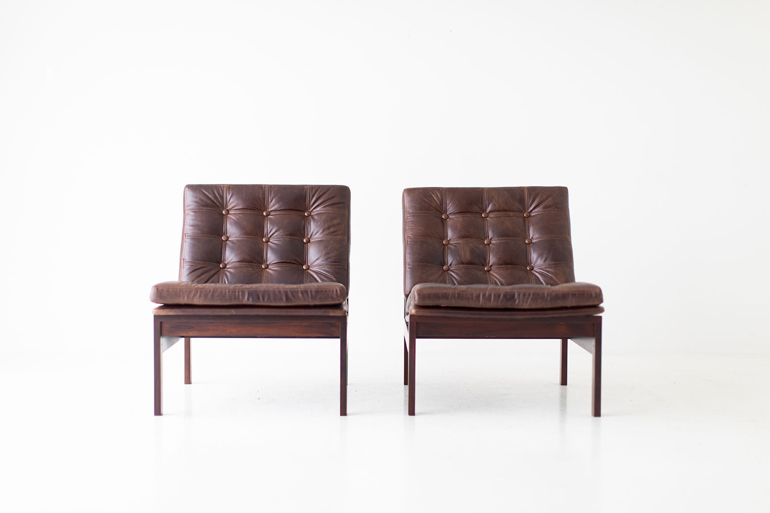 Ole Gjerløv Knudsen & Torben Lind Rosewood and Leather Lounge Chairs