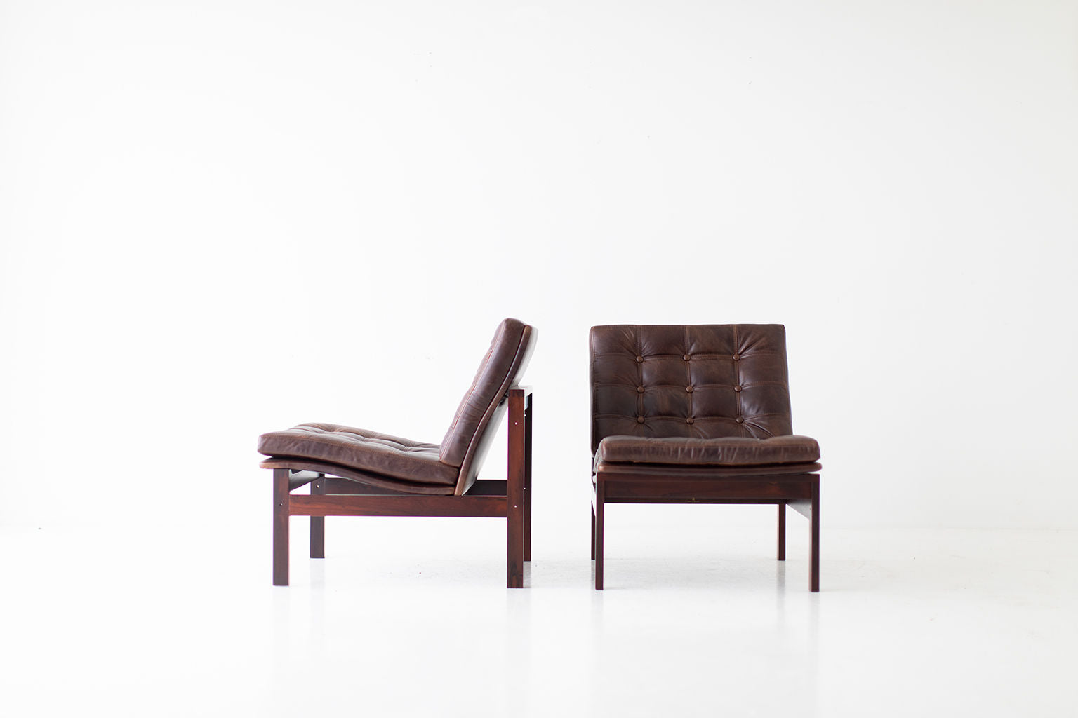 Ole Gjerløv Knudsen & Torben Lind Rosewood and Leather Lounge Chairs