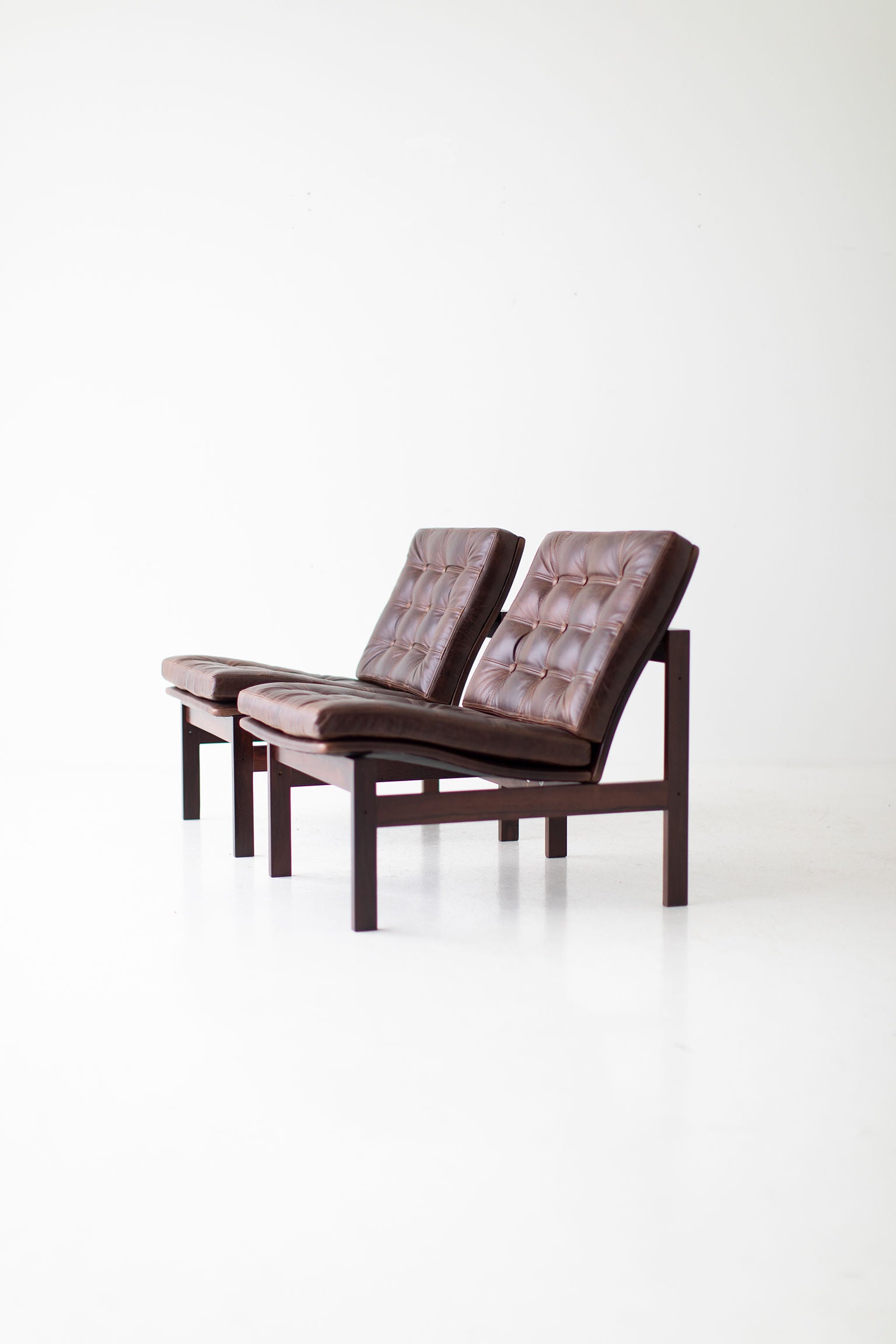 Ole Gjerløv Knudsen & Torben Lind Rosewood and Leather Lounge Chairs