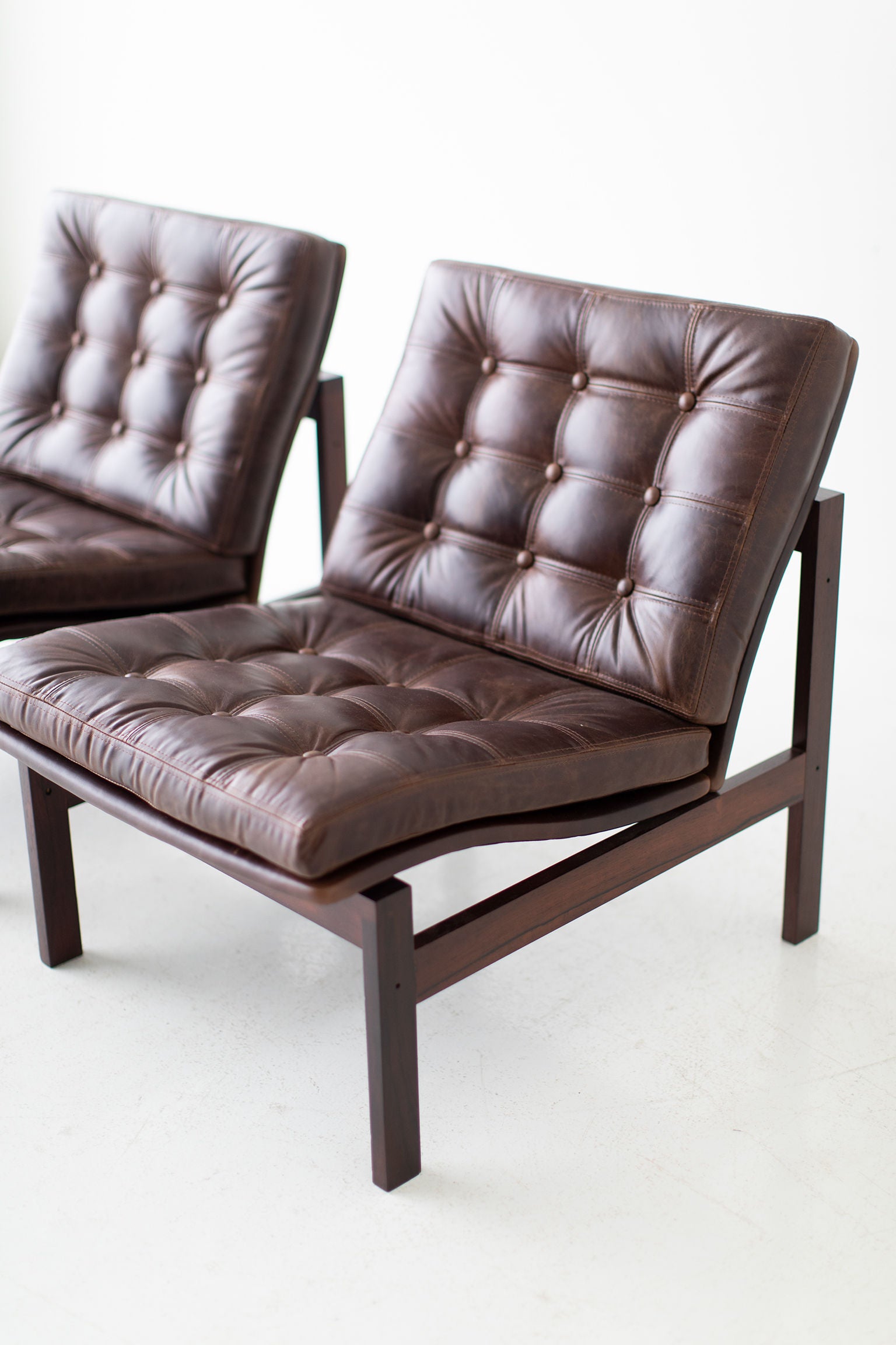 Ole Gjerløv Knudsen & Torben Lind Rosewood and Leather Lounge Chairs