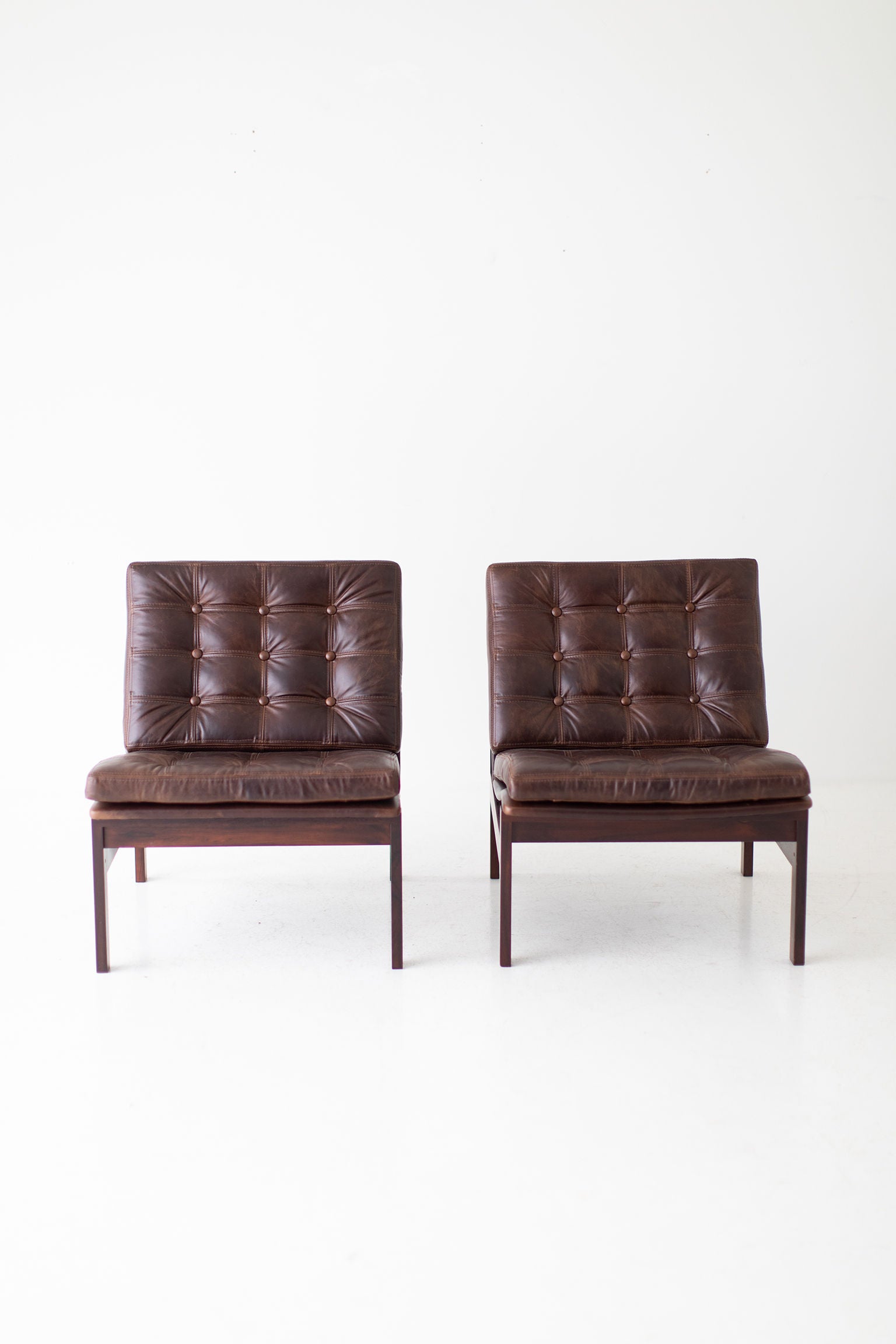 Ole Gjerløv Knudsen & Torben Lind Rosewood and Leather Lounge Chairs