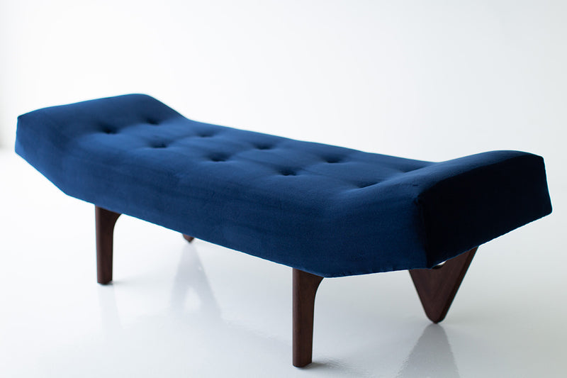 Detail of the joinery where the modern luxury Alaska bench's oak frame meets its walnut legs