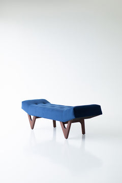 Full view of the modern luxury Alaska upholstered walnut and oak bench by Craft Associates against a neutral backdrop