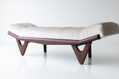 Modern luxury Alaska wood bench with an upholstered seat on a sculptural solid walnut base by Craft Associates, front view