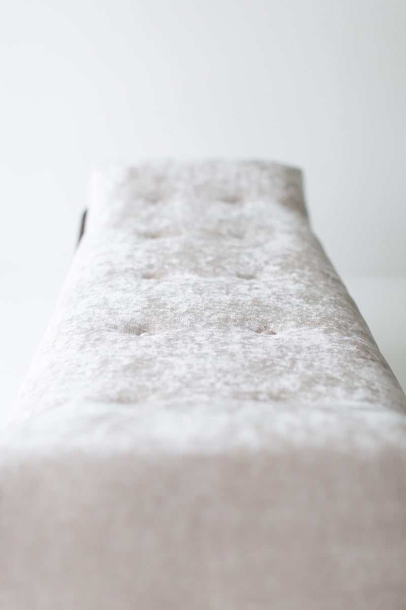 Modern luxury Alaska walnut wood bench styled in an entryway
