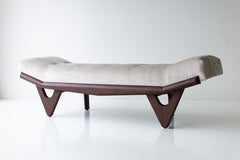 Full view of the modern luxury Alaska walnut and oak wood bench by Craft Associates against a neutral backdrop