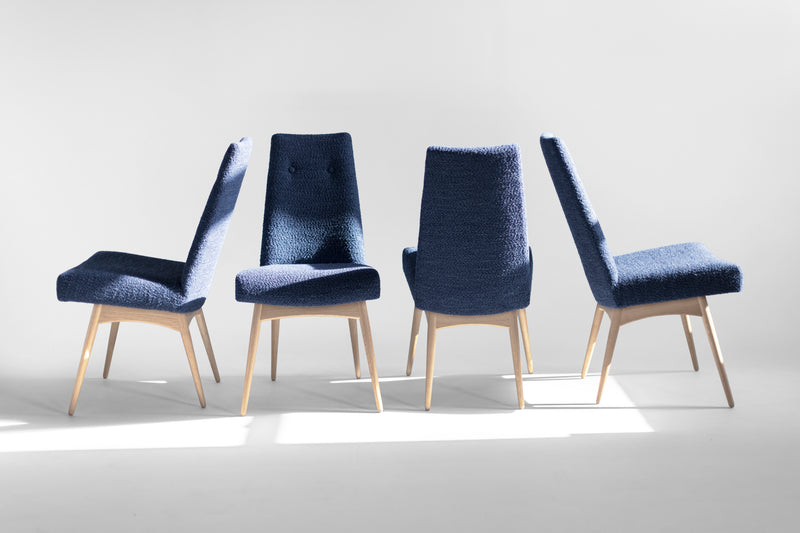 Side profile of the modern luxury Alto walnut upholstered dining chair by Craft Associates