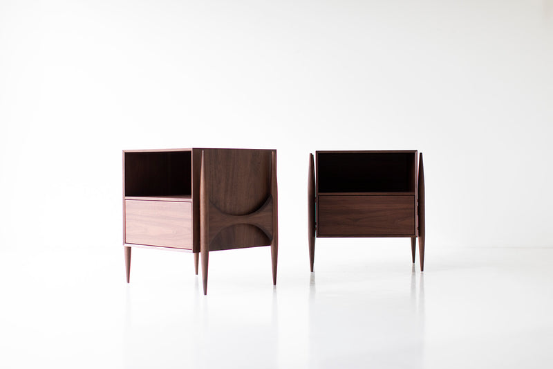 Close-up of rich walnut wood grain on a modern luxury Cambre nightstand