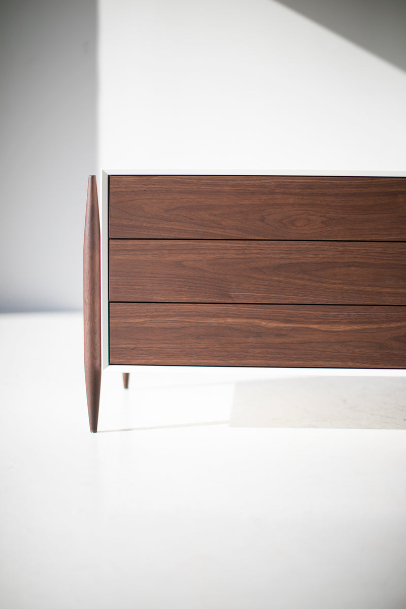 Modern luxury walnut Cambre nightstand styled in a bedroom