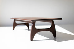 Craft Associates walnut coffee table showing solid wood construction