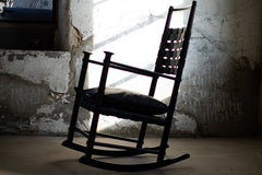 Modern luxury black leather rocking chair by Craft Associates®, Catawba design front view