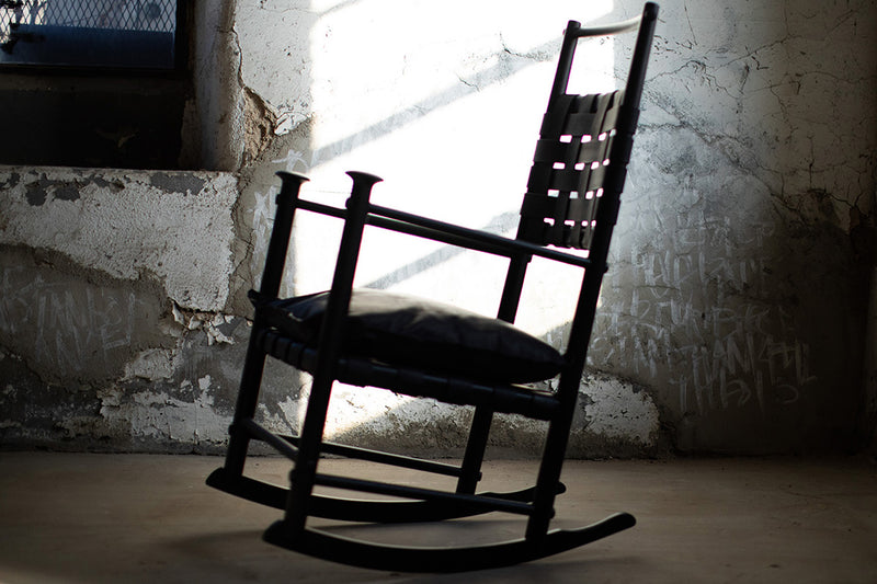 Modern luxury black leather rocking chair by Craft Associates®, Catawba design front view