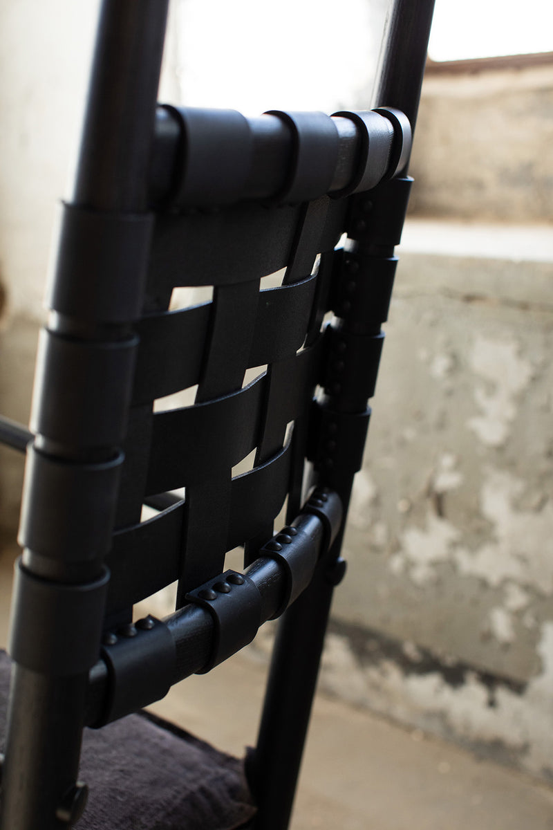 Handcrafted modern luxury Catawba rocking chair by Craft Associates® shown at an angle