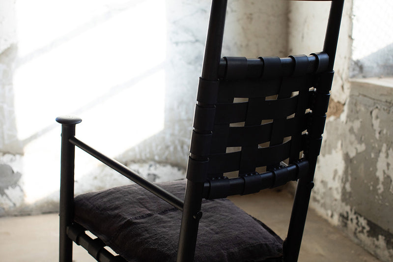 Side profile of the modern luxury Catawba black leather rocking chair by Craft Associates®