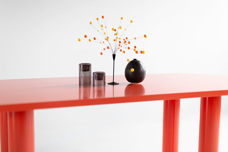 The Cava table used as a desk in a colorful modern office