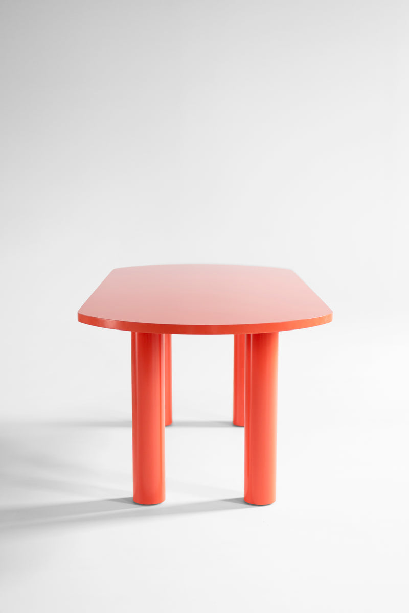 Top-down view of the glossy coral tabletop