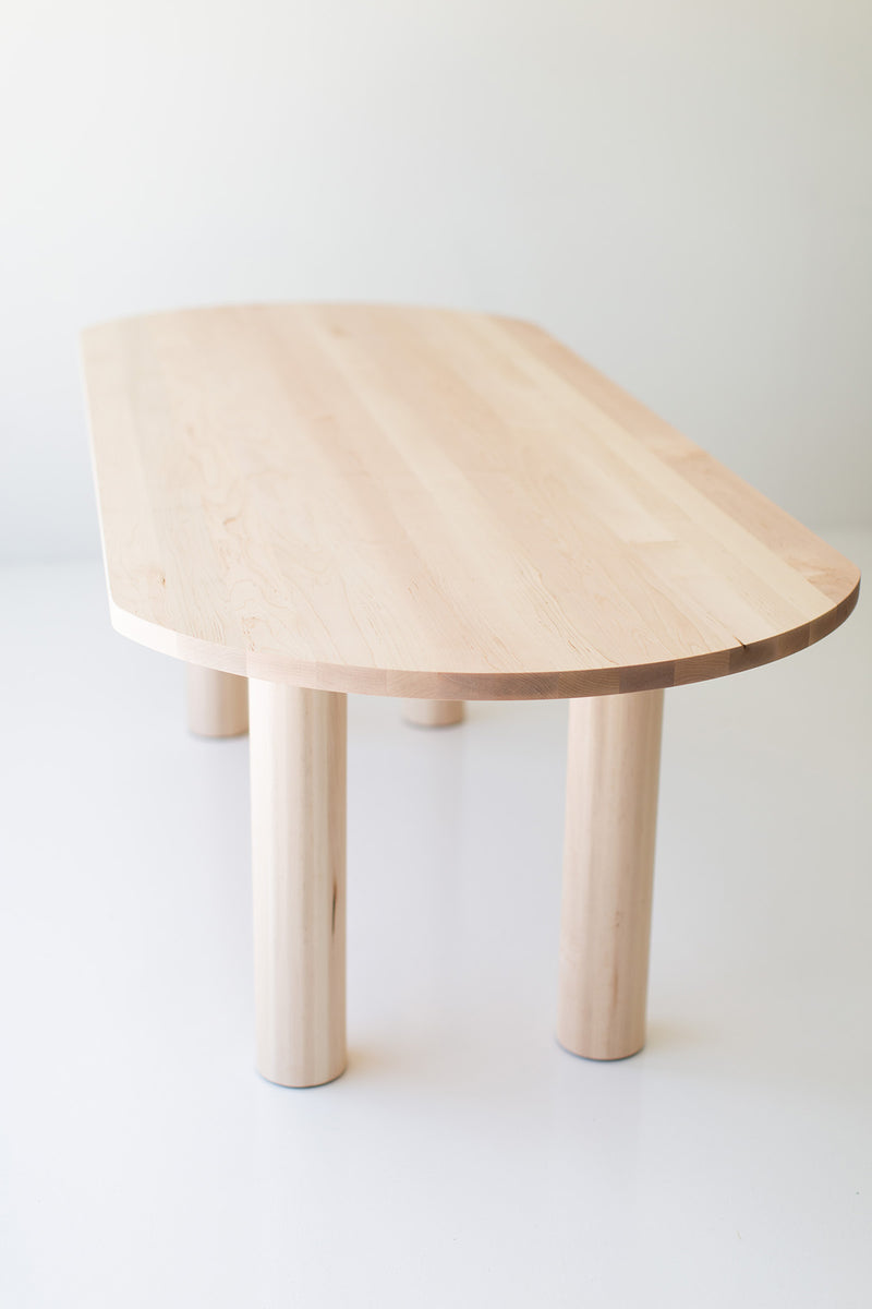 Cava oval dining table set for entertaining with place settings