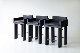 Modern luxury Chile counter stool in blackened oak with a woven fabric cushion