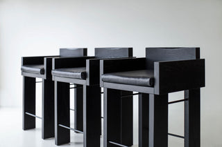 Row of Chile counter stools styled at a kitchen island