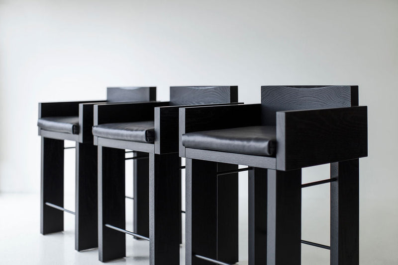 Row of Chile counter stools styled at a kitchen island