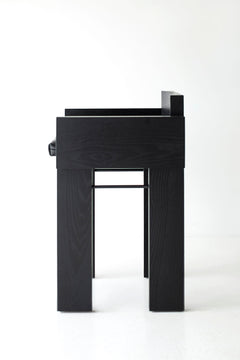 Overhead view of a counter stool cushion in blackened oak