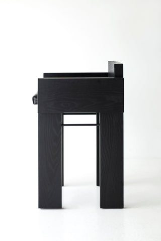 Overhead view of a counter stool cushion in blackened oak