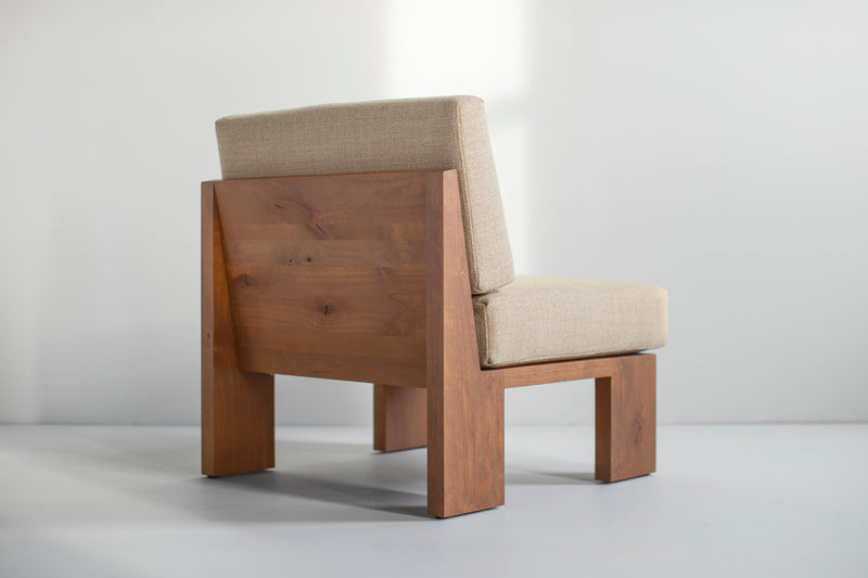 Modern lounge chair in greywash finish with thick weave fabric cushions