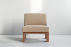 Close-up of the thick weave fabric cushion on a greywash lounge chair