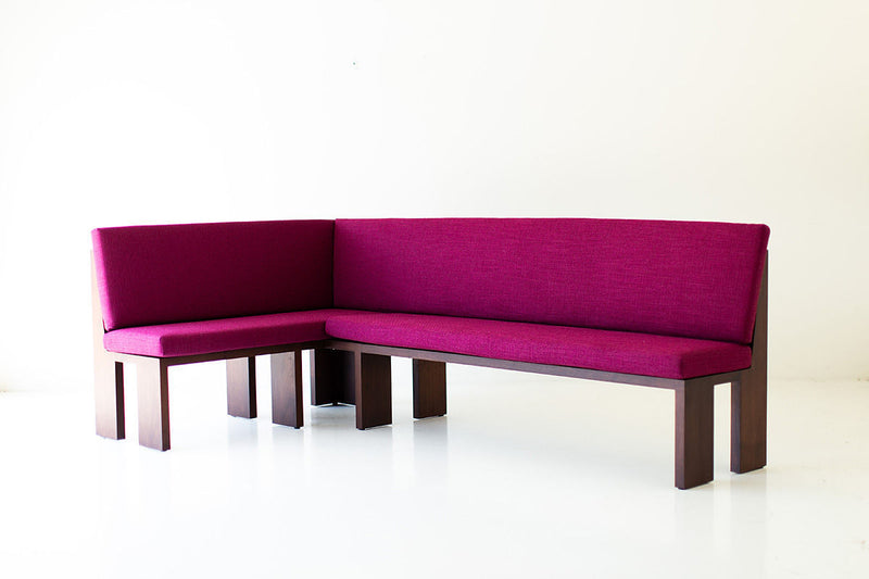 Modern luxury solid walnut dining banquette with a low, sleek silhouette