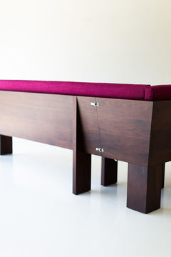 Modern luxury Chile banquette in walnut styled in a corner dining nook