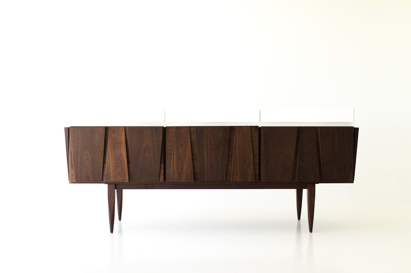 Handcrafted modern 3-bay Eiger walnut credenza by Craft Associates® shown at a three-quarter angle