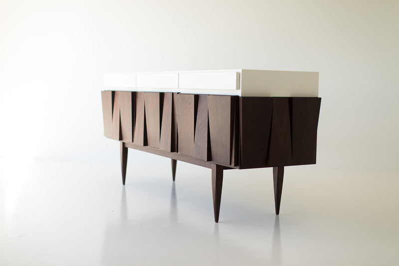 Close-up of the cabinet door detailing on the modern walnut 3-bay Eiger luxury credenza