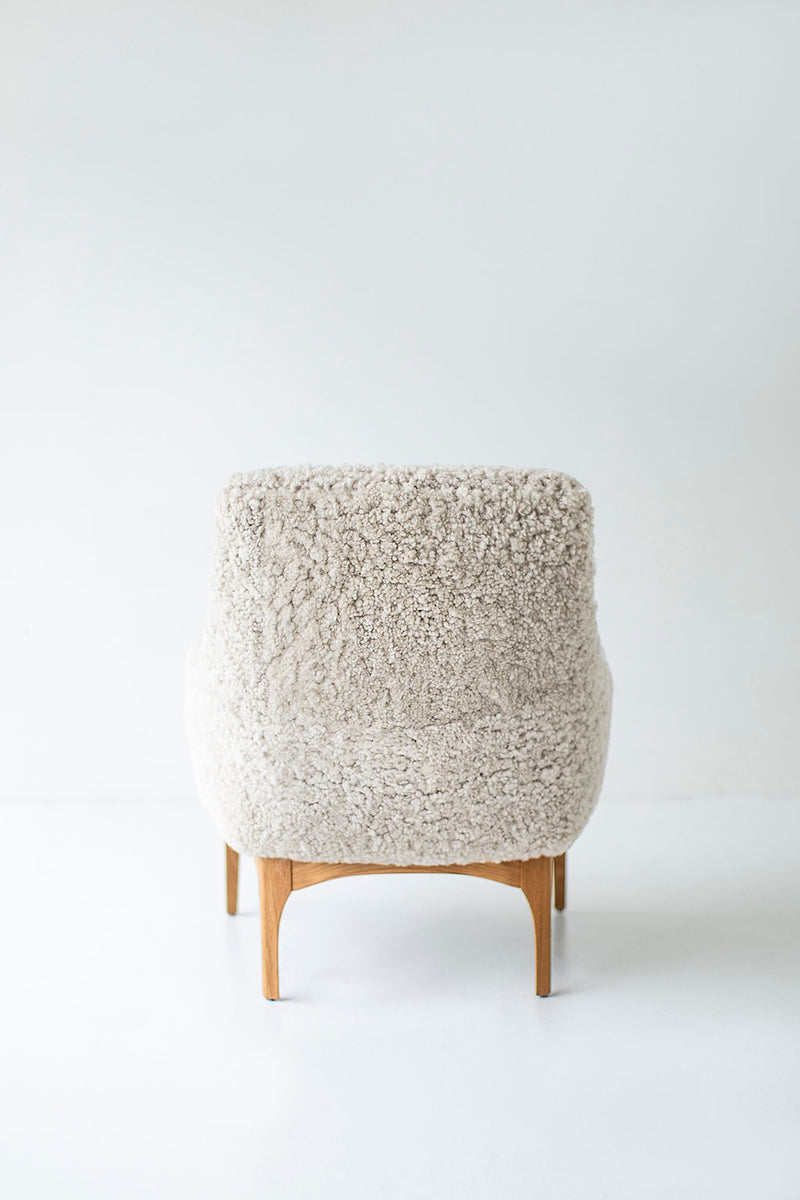 Close-up of the shearling texture and hand stitching on the modern luxury Nantucket lounge chair