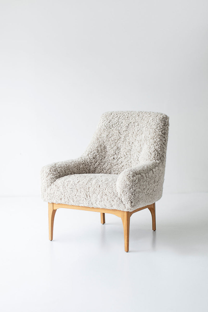Close-up of the armrest and shearling detail on the modern luxury Nantucket lounge chair