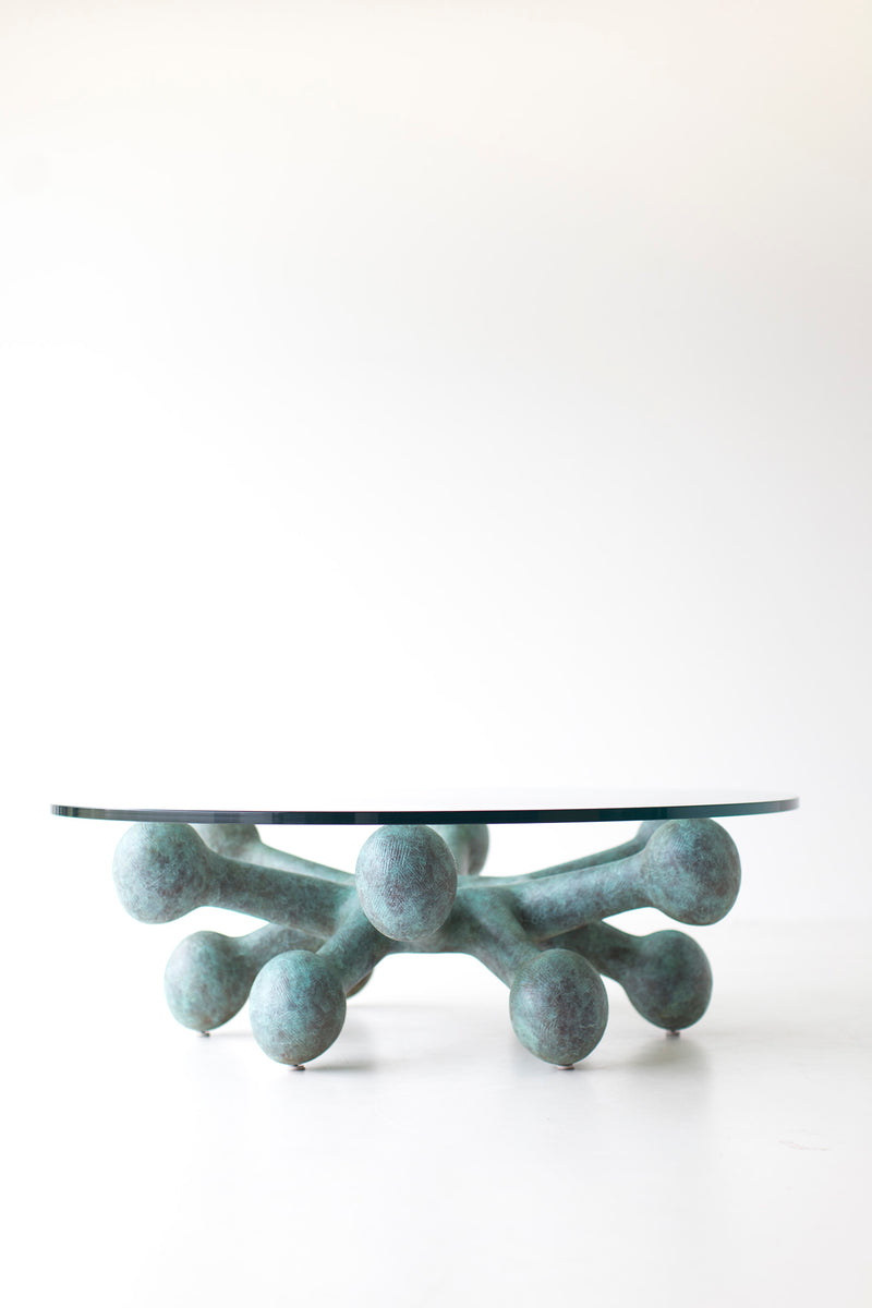 Bronze coffee table showing hand-welded and hand-patinaed base detail