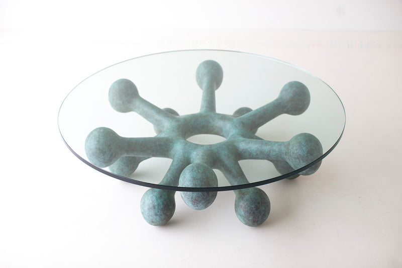 Side profile of the Craft Associates bronze and glass coffee table