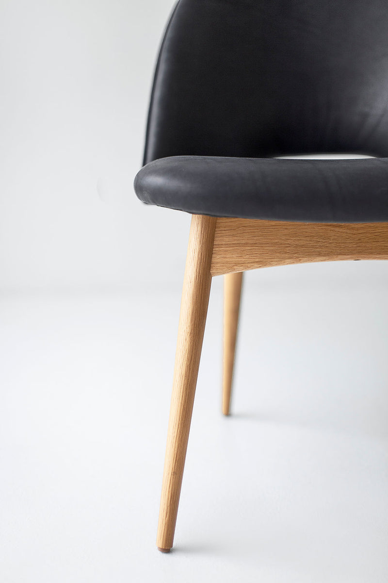 Front view of a Craft Executive side chair showing its leather seat