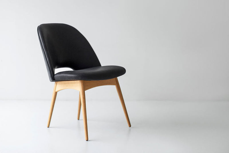 Row of Craft Executive side chairs styled at a dining table