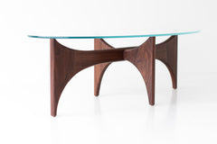 Craft modern oval coffee table styled in a living room setting