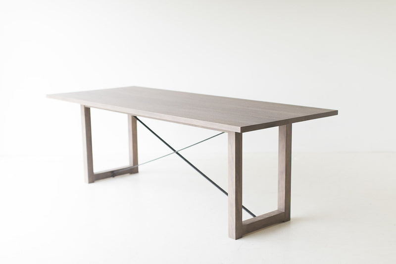 Modern luxury distressed grey dining table by Bertu Home, front view