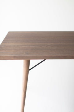 Detail of the tapered legs on the distressed dining table