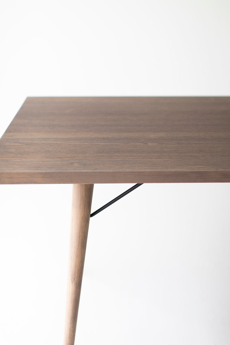 Detail of the tapered legs on the distressed dining table