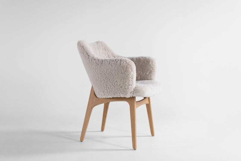 Executive dining chair styled in a modern dining room