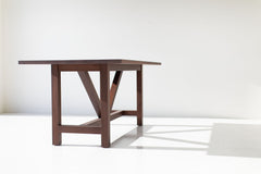 Close-up of the black walnut wood grain on the modern luxury farm table