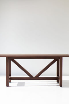 Modern luxury walnut farm table styled as a desk