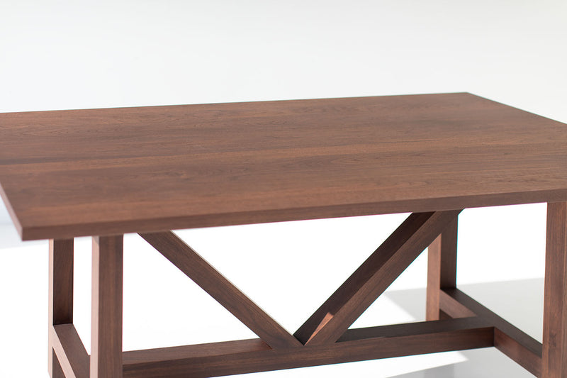 Modern luxury walnut farm table shown from above