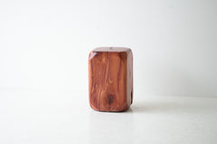 Modern indoor outdoor cedar stool in a bright outdoor space