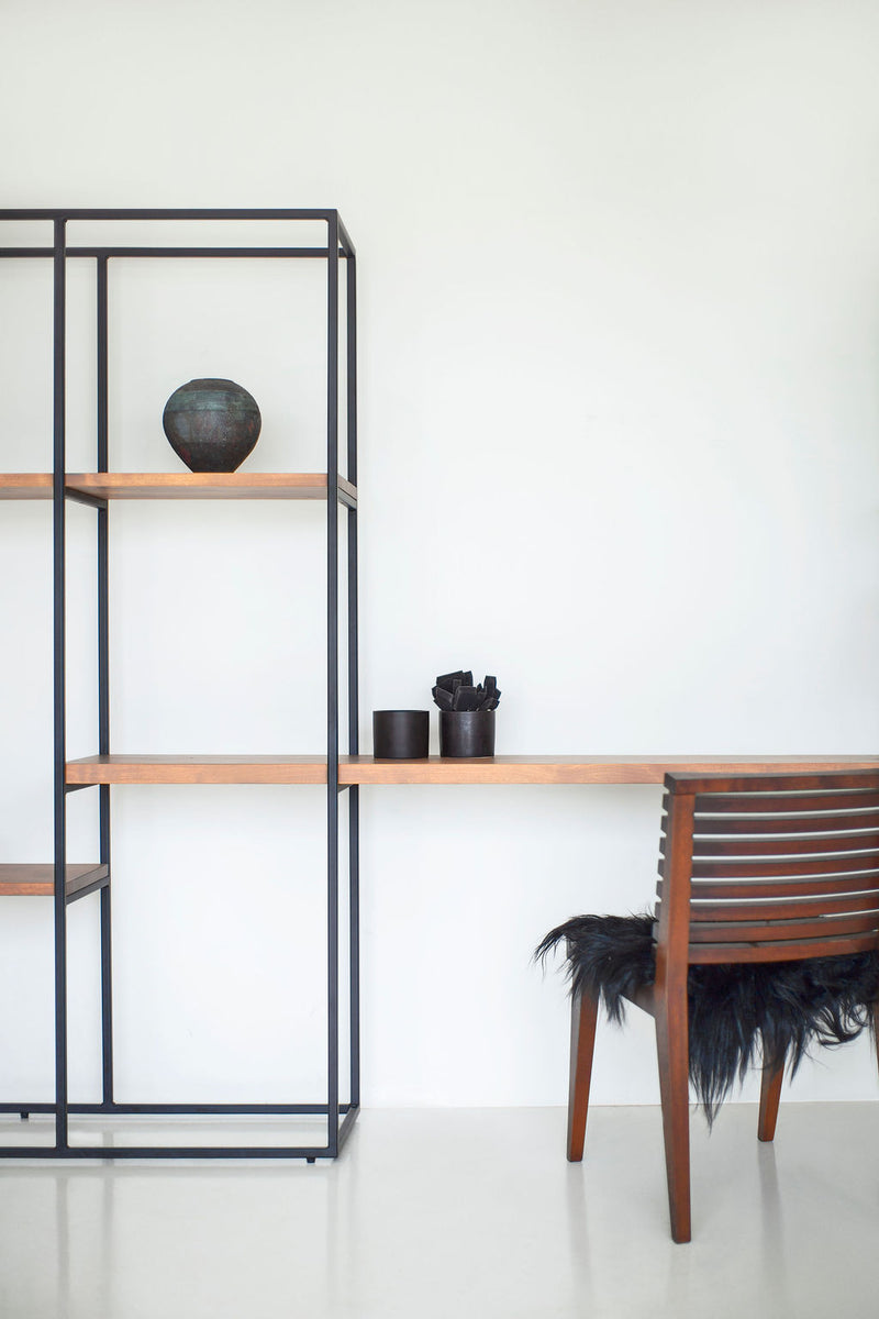 Overhead view of the floating desk surface on an industrial wall unit