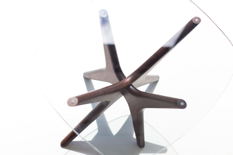Jax side table styled next to a mid-century modern sofa