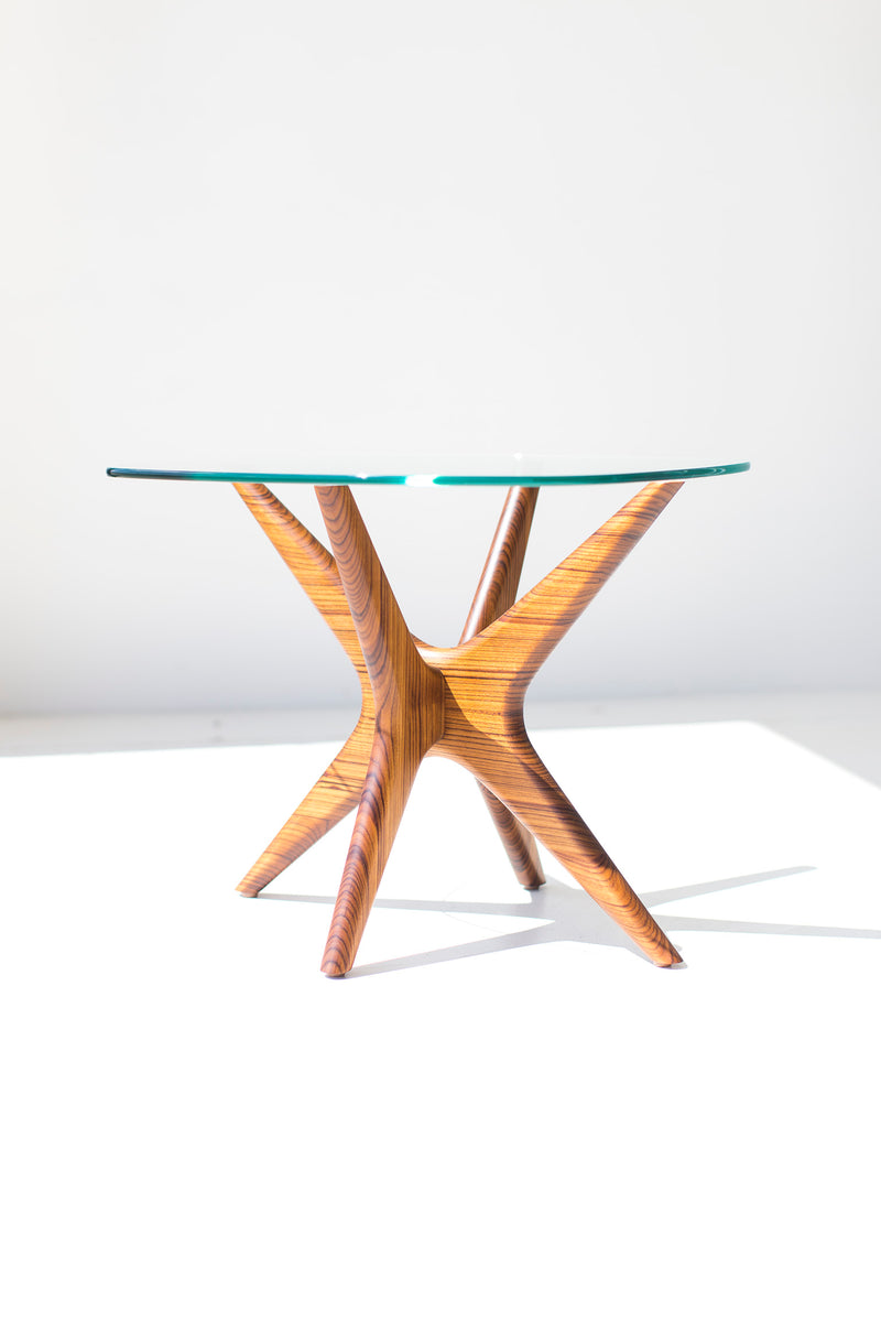 Angled view of the Jax walnut side table with glass top